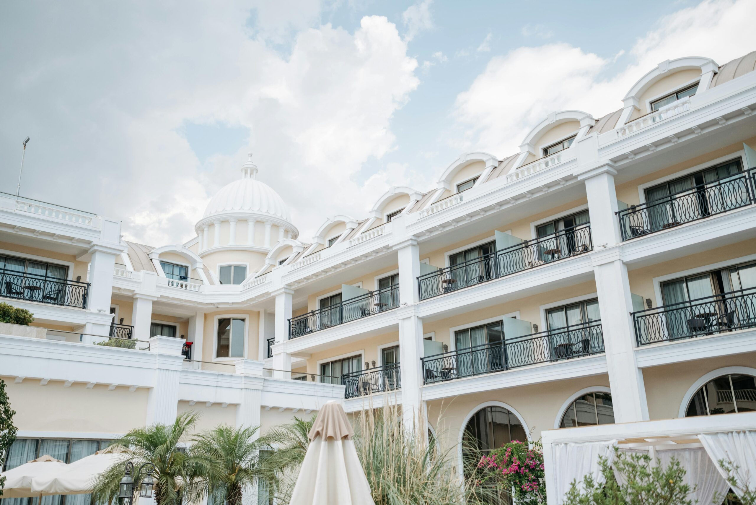 A classic resort facade under a bright sky, perfect for travel and vacation imagery.